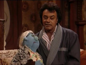Johnny Mathis croons to Mama Fiama.