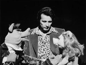 Hoggie Marsh and Alpert introduce an audience to "Piggy"