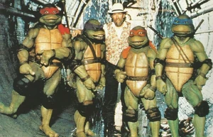 Jim Henson with the Creature Shop's animatronic Ninja Turtles