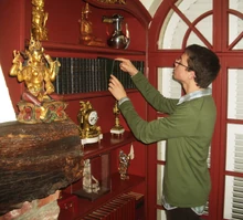 His Majesty looking in his library