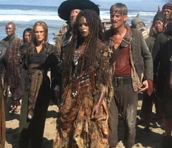 Tia Dalma with members of Jack Sparrow's former crew.