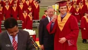 Clark gets his diploma.