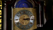Lex sees a clock.