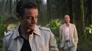 Professor Fine and Lex discuss the ship.
