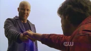 Clark defeats Zod with the Crystal of El.
