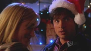 Clark helps Chloe deliver toys.