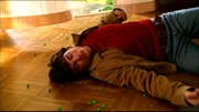 Clark weakened by kryptonite beads.