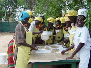 Turkana women in Lokichoggio, Kenya making CooKits as part of a project supported by Lift Up Africa.