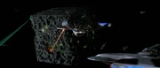 The Federation fleet engages the Borg Cube.