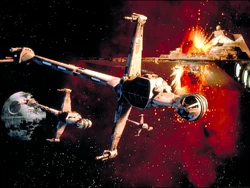 B-wing starfighters flee an exploding Imperial Star Destroyer.