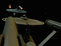 Two mighty starships.