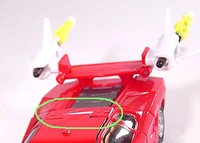 Due to Prowl's mold layout, changing the outer shell of car while leaving the limbs white for Sideswipe left a white part on the roof that had to be covered by a sticker.  All of Sideswipe's white plastic (and the corresponding parts on other versions of the mold) cannot hold paint.