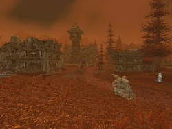Corin's Crossing as it is today, consumed by the Scourge. When Saavedro was born, this was a busy crossroads between Tyr's Hand and Stratholme in the east, and Darrowshire, Caer Darrow, Andorhal, Hearthglen and Lordaeron City to the west. The Magistrate's estate is the house to the right of the town hall.